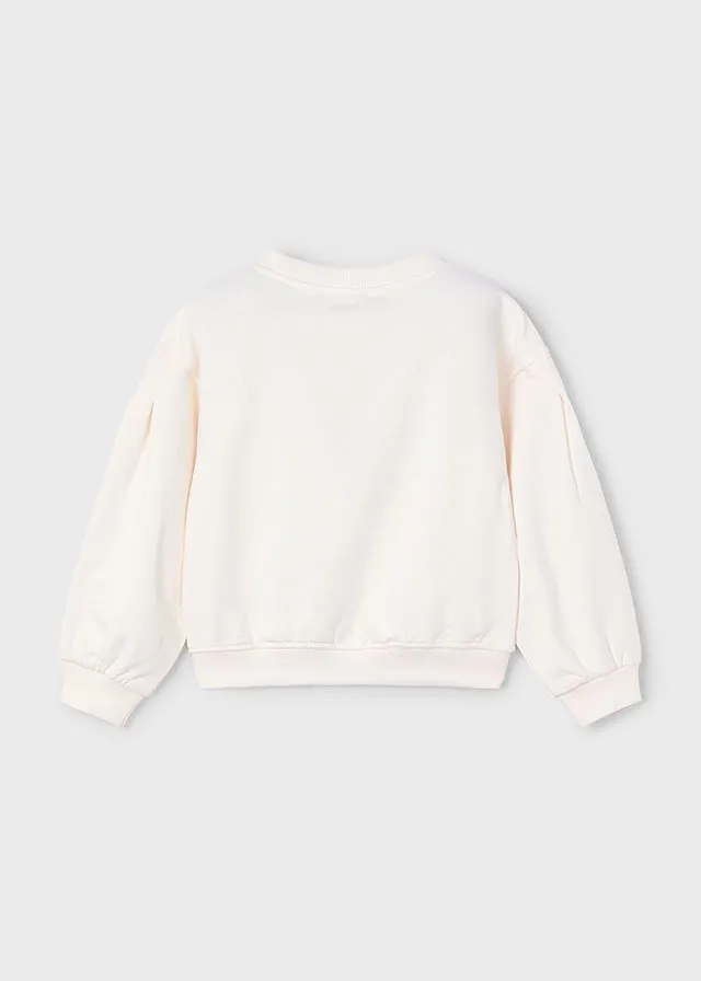 Sweater con complemento