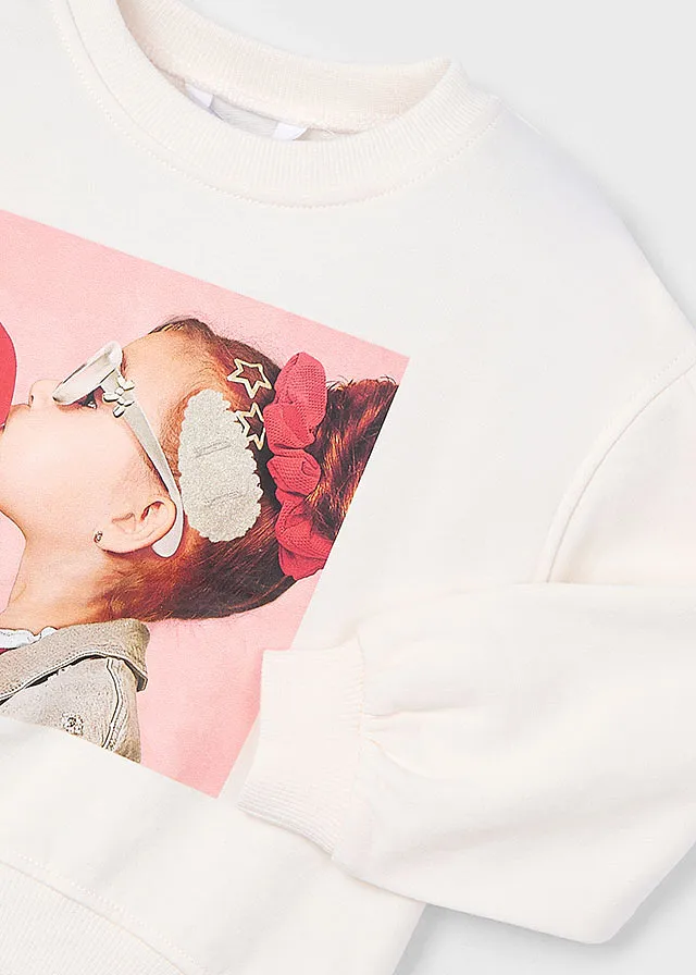 Sweater con complemento