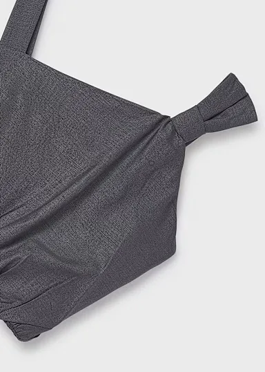 Top lazo asimetrico